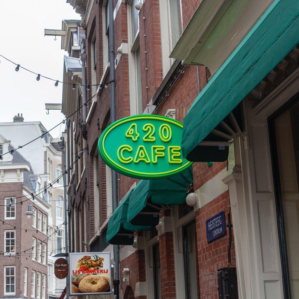 420 Cafe storefront and green neon sign on Heisteeg in Amsterdam