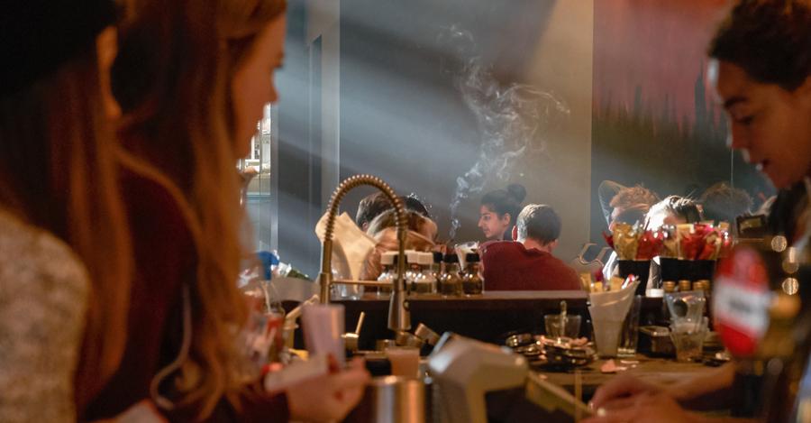 Barney's social interior with light and smoke