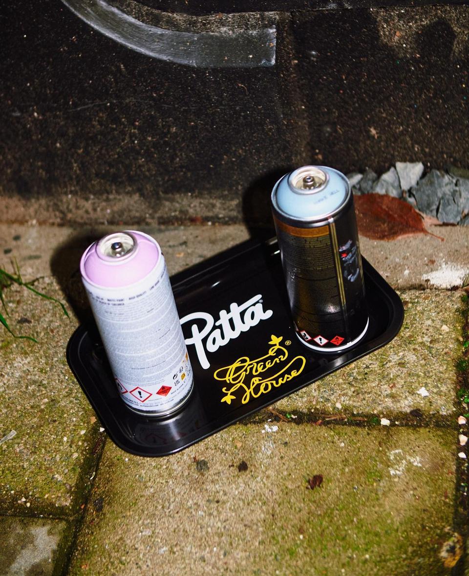 Green House and Patta branded tray with spray cans