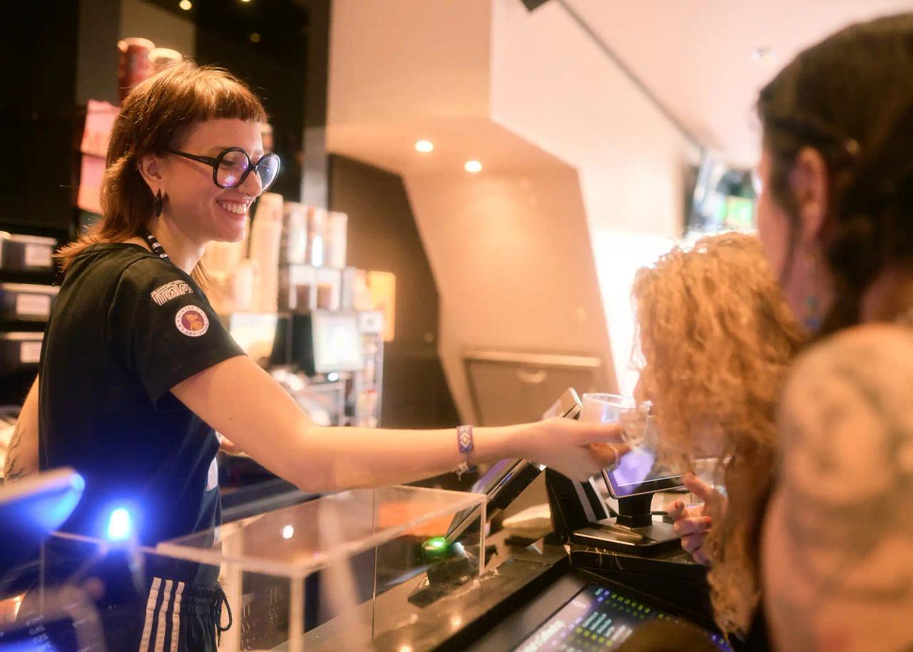 Hunter's staff member serving customers at the counter