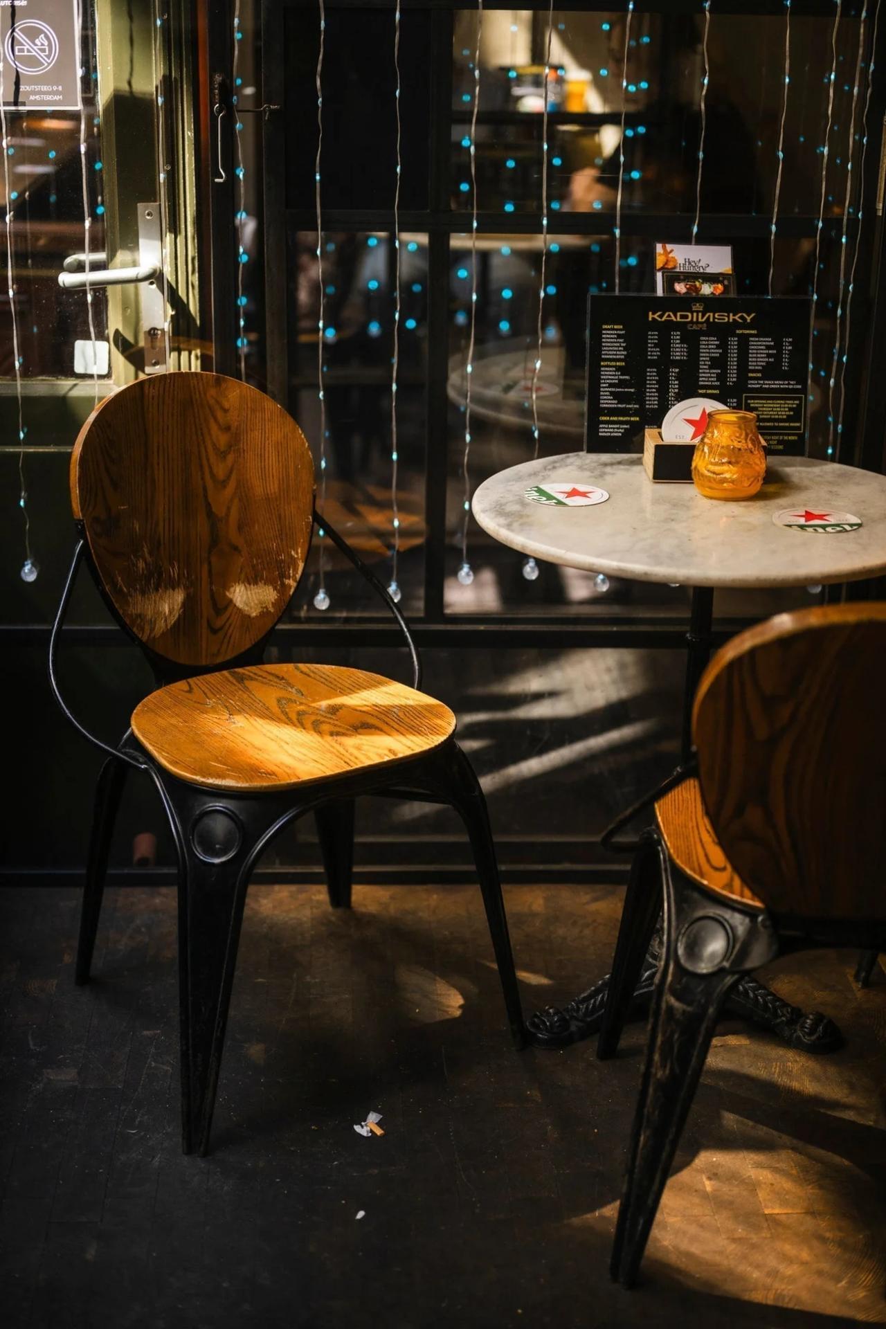 Kadinsky café seating and menu detail in Amsterdam