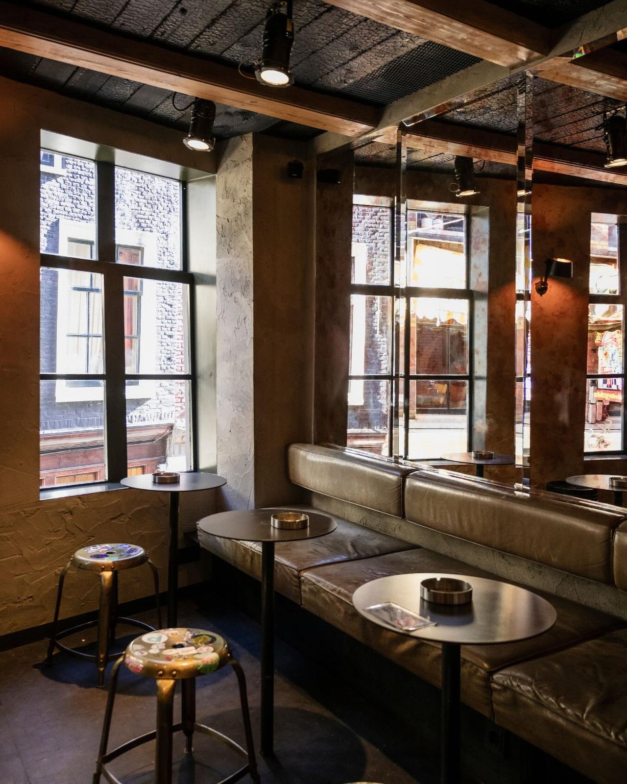 Kadinsky interior seating with mirrored walls and street-facing windows